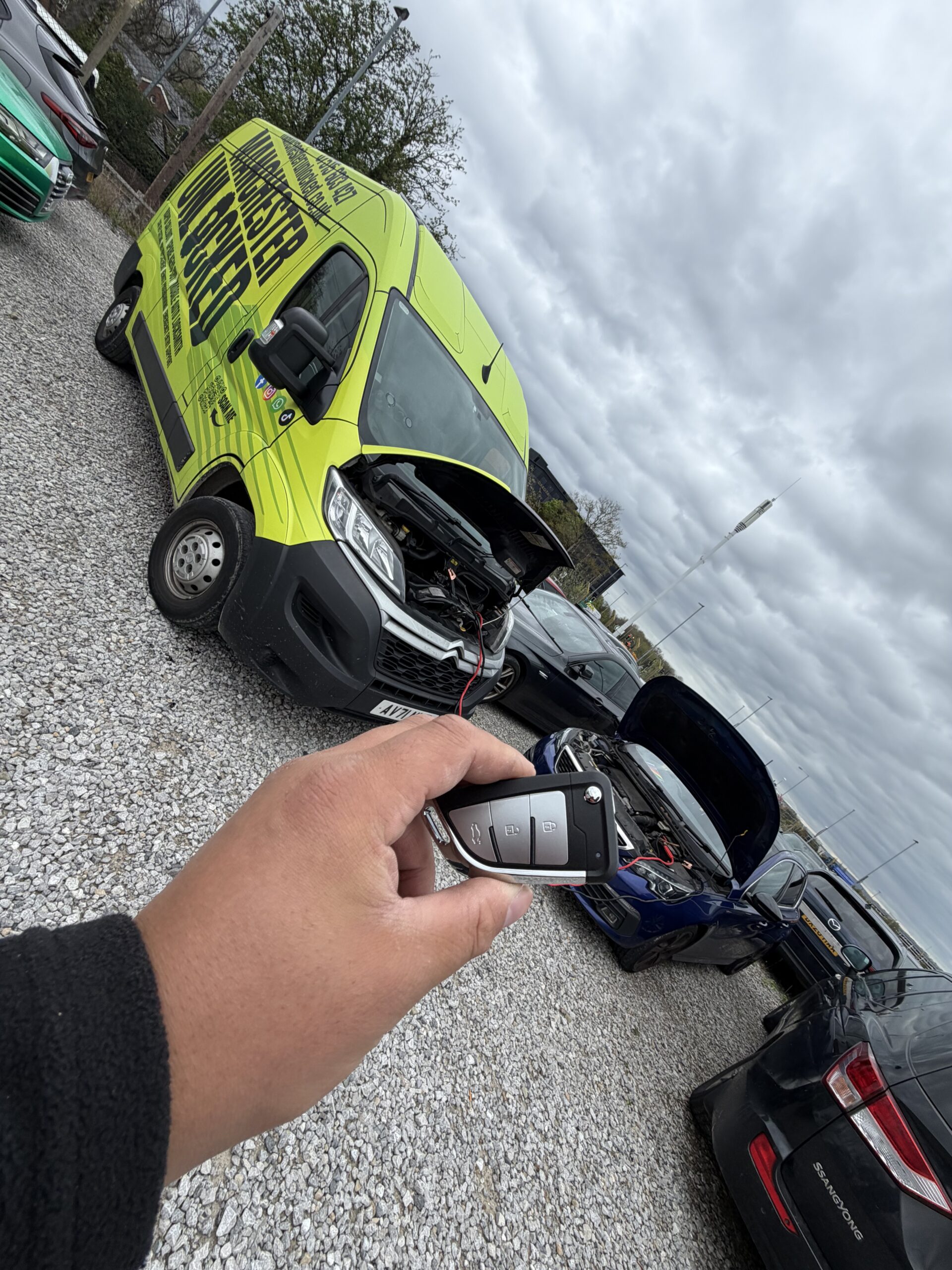 Manchester Unlocked mobile locksmith van and car at Manchester Airport